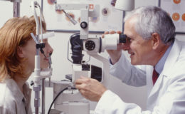 Optometrist with patient